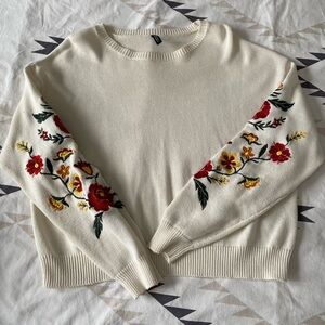 Embroidered pull
Size L